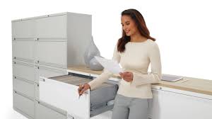 Modern metal filing cabinet in professional NZ office setting for document storage
