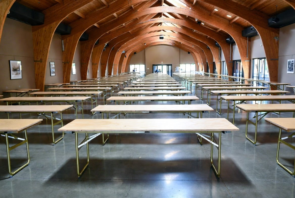 Rows of heavy duty folding tables arranged for a conference or wedding reception in NZ