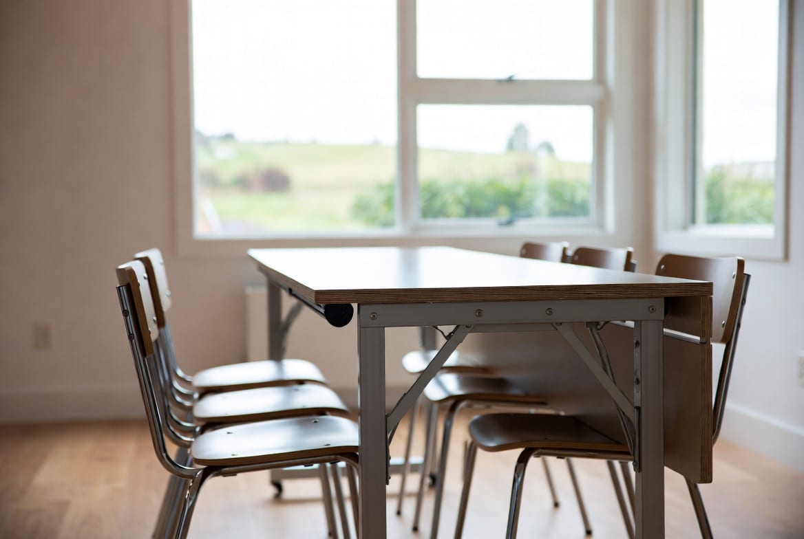 Fold up table set up in modern NZ home or event space
