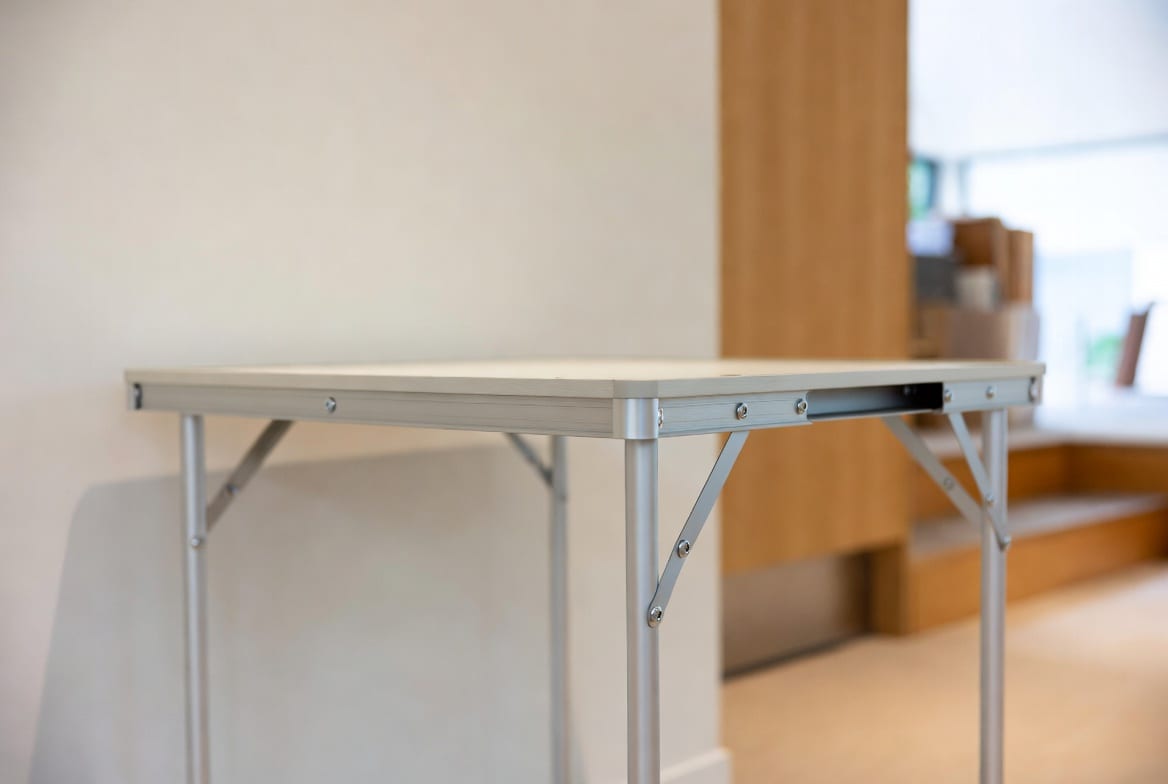Compact portable folding table suitable for Wellington homes and events