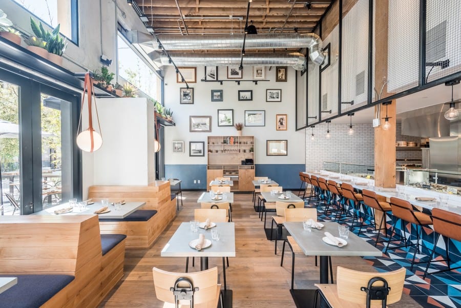 Modern New Zealand cafe interior featuring stylish durable cafe chairs and welcoming dining setup