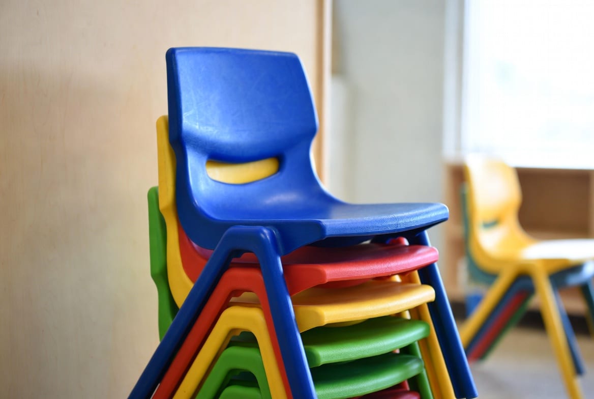 Colourful stackable plastic chairs suitable for preschool and early childhood centres